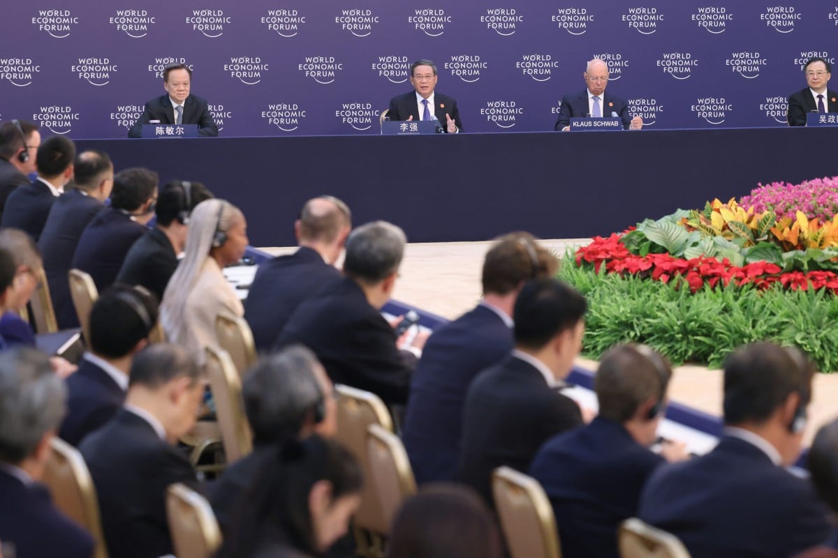 Chinese Premier Li Qiang attends an entrepreneur dialogue and exchanges ideas with entrepreneurs at the 14th Annual Meeting of the New Champions in north China’s Tianjin. Photo: Xinhua